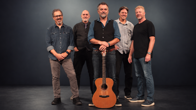 studio portrait of the 5 musicians who make up the band "the Late Boomers"