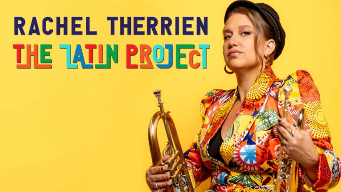 trumpeter rachel therrien wearing a colorful patterned jacket and looking sideways to the camera while holding her trumpet